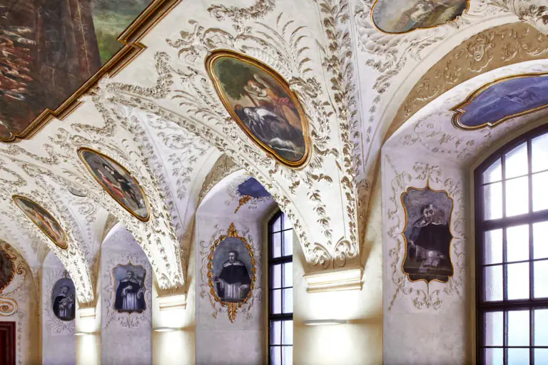 Frescoed ceiling and architectural detail inside the Baroque Refectory