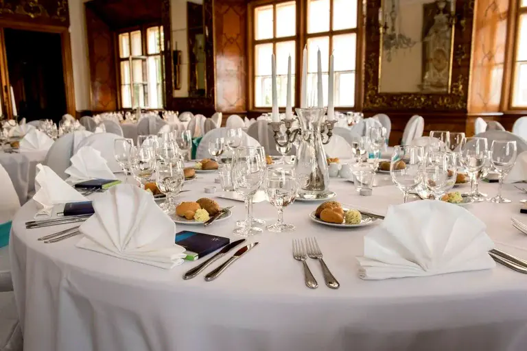 Formal round table prepared for a palace dinner