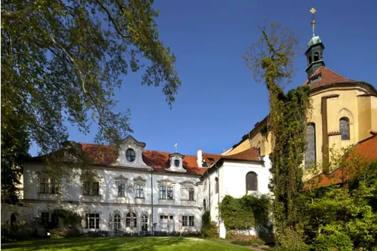 Secluded palace garden beside a historic Prague residence