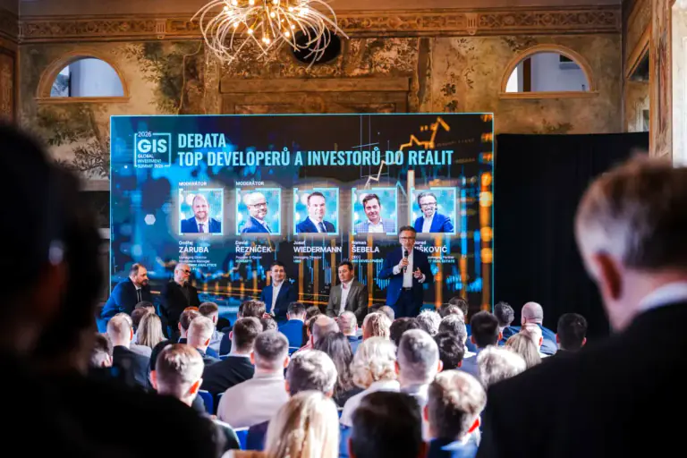 Global Investment Summit 2026 panel in a painted Martinic Palace hall