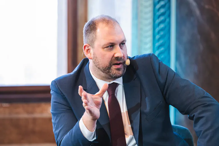 Ondřej Záruba speaking at a conference